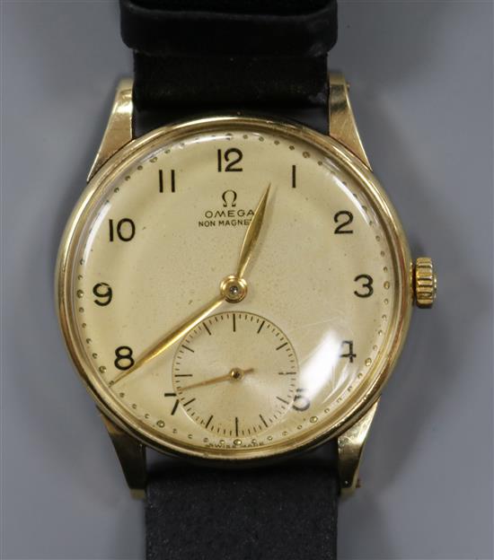 A gentlemans 1940s 14ct gold Omega manual wind wrist watch.